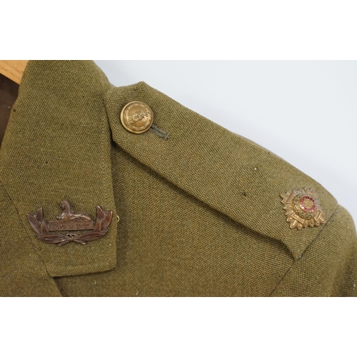 368 - British Army uniform jacket, trousers, No.2 dress, badge for the Gloucestershire regiment complete w... 