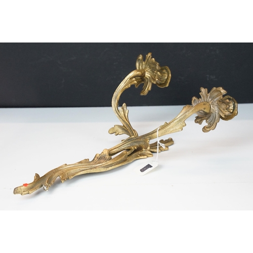 372 - Pair of Rococo style brass wall candle sconces with twin branches and interweaving design, approx. H... 