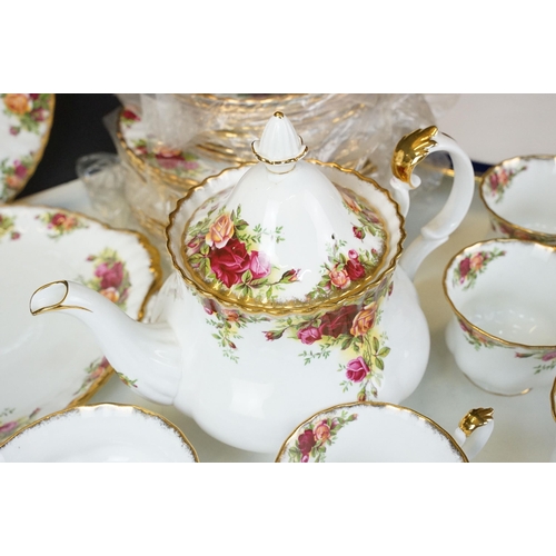 118 - Large collection of 'Old Country Roses' gilt and rose tea service set to include two cake plates, tw... 