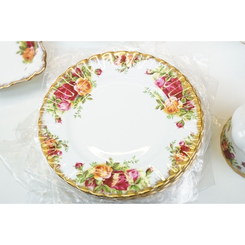 118 - Large collection of 'Old Country Roses' gilt and rose tea service set to include two cake plates, tw... 