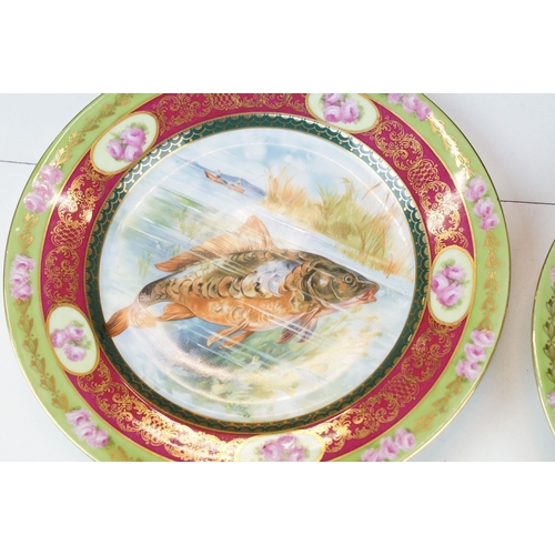 120 - Set of five Pauly & Co fish plates, diameter 21cm, together with sauce boat on stand, 
Limoges colba... 