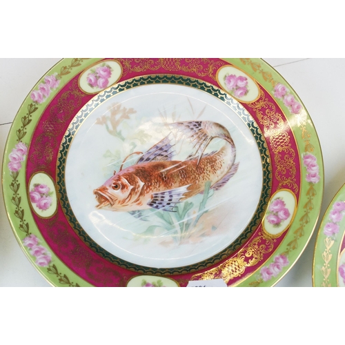 120 - Set of five Pauly & Co fish plates, diameter 21cm, together with sauce boat on stand, 
Limoges colba... 