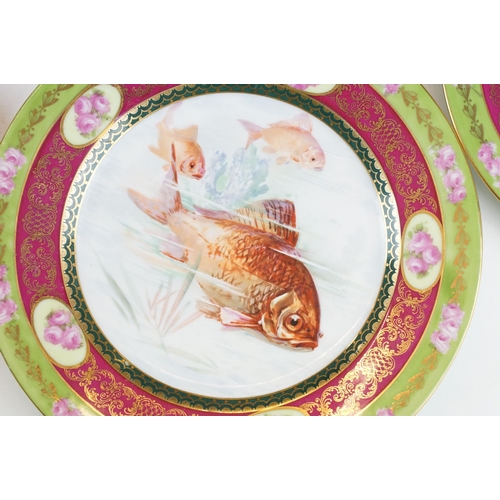 120 - Set of five Pauly & Co fish plates, diameter 21cm, together with sauce boat on stand, 
Limoges colba... 