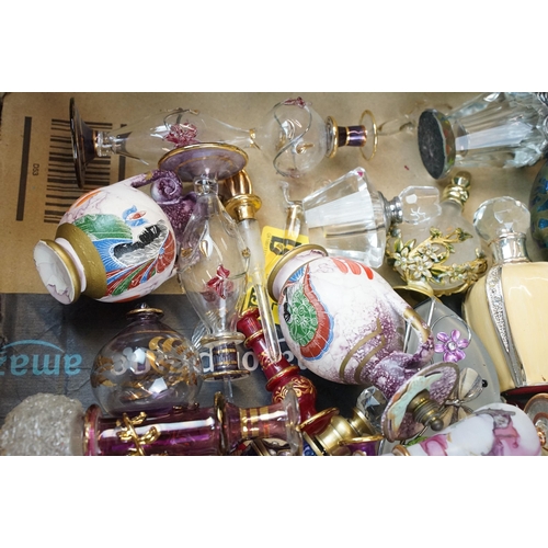 122 - Large quantity of perfume and scent bottles in varying forms and finishes