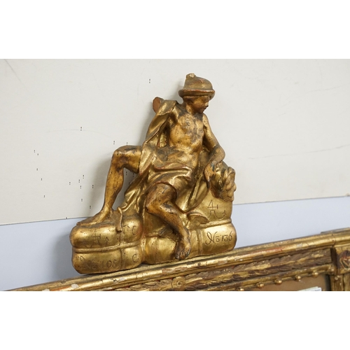 560 - 19th century gilt rectangular wall mirror, with ornamental pediment featuring a Classical man reclin... 