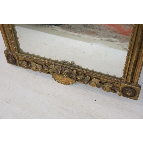 560 - 19th century gilt rectangular wall mirror, with ornamental pediment featuring a Classical man reclin... 