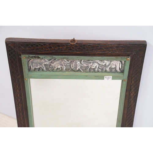 557 - Vintage carved wooden wall mirror with white metal plaques depicting elephants and hippos, 53 x 36.5... 