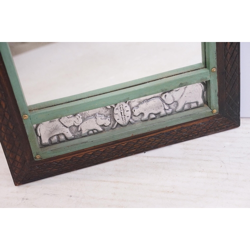 557 - Vintage carved wooden wall mirror with white metal plaques depicting elephants and hippos, 53 x 36.5... 