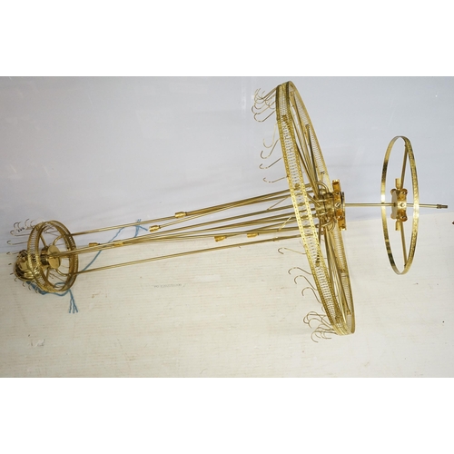 642 - Large chandelier frame light fitting in brass with wheel top leading down to tiered light levels, ho... 