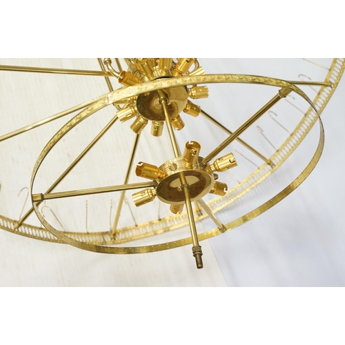 642 - Large chandelier frame light fitting in brass with wheel top leading down to tiered light levels, ho... 