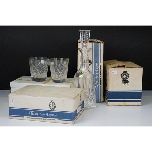 396 - A collection of Waterford Crystal glasses within original boxes to include wine glasses and tumblers... 