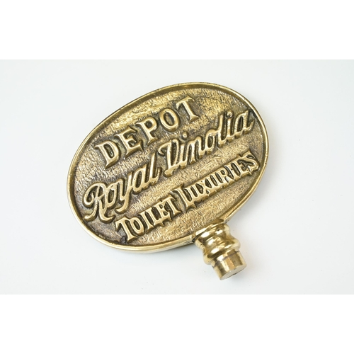 397 - A Depot Royal Vinolia Toilet Luxuries brass double sided sign together with an unusual brass item ma... 