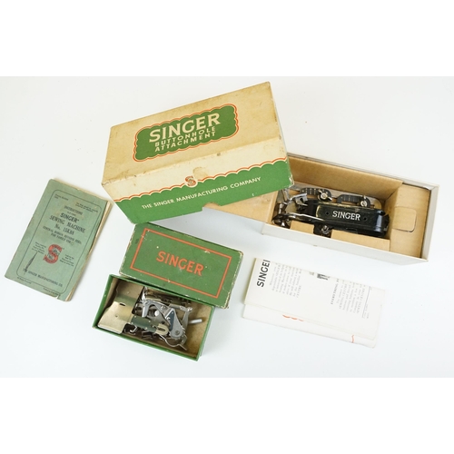 403 - Early 20th Century singer sewing machine set within wooden case together with a later Singer example... 