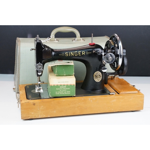 403 - Early 20th Century singer sewing machine set within wooden case together with a later Singer example... 