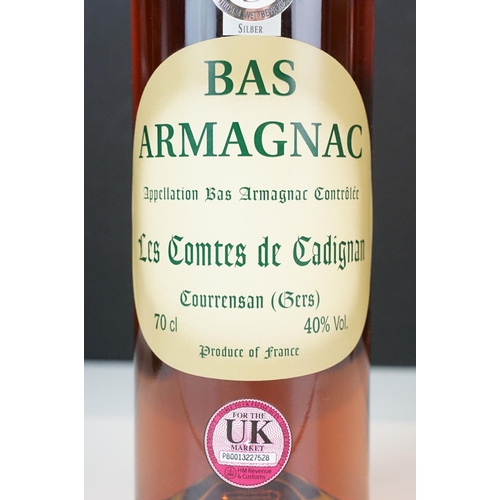 434A - Alcohol - six bottles, comprising: Suntory Whisky Royal, 720ml, boxed, Armagnac Les Comtes de Cadign... 