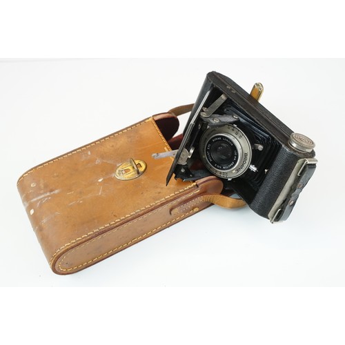 398 - Collection of cameras to include a folding Brownie 'Dakon' shutter, Canon AE-1, Comet film camera, l... 