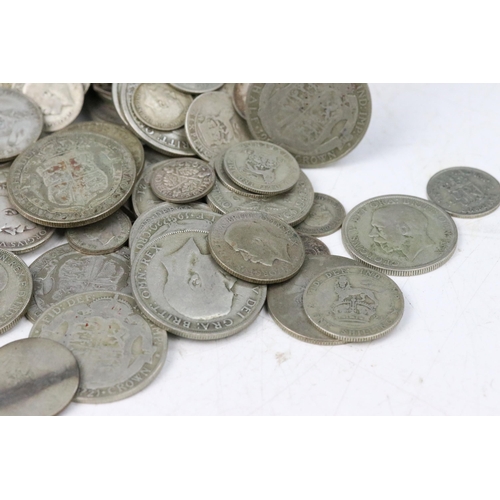 195 - A collection of British pre decimal silver coins to include pre 1920 and pre 1947 examples including... 