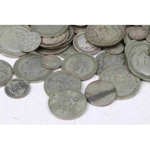 195 - A collection of British pre decimal silver coins to include pre 1920 and pre 1947 examples including... 