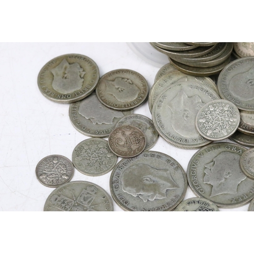 195 - A collection of British pre decimal silver coins to include pre 1920 and pre 1947 examples including... 