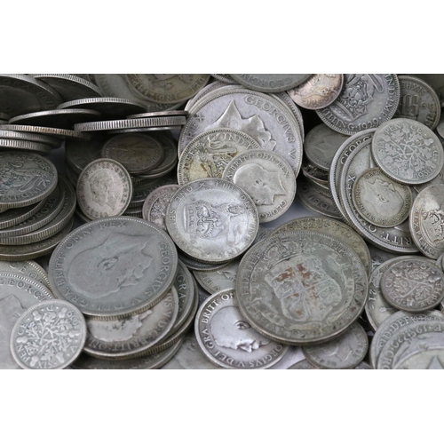 195 - A collection of British pre decimal silver coins to include pre 1920 and pre 1947 examples including... 