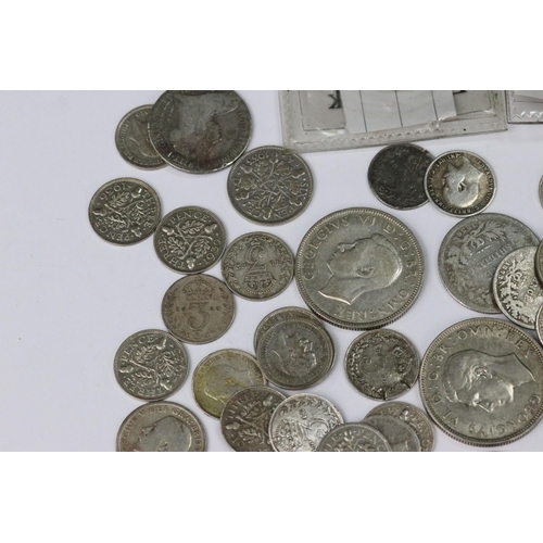 199 - A small collection of British pre decimal silver coins to include double florin, florins, shillings,... 