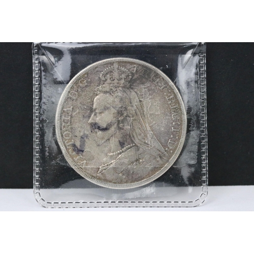 202 - Two United Kingdom Queen Victoria pre decimal silver full crown coins to include 1890 and 1889 examp... 