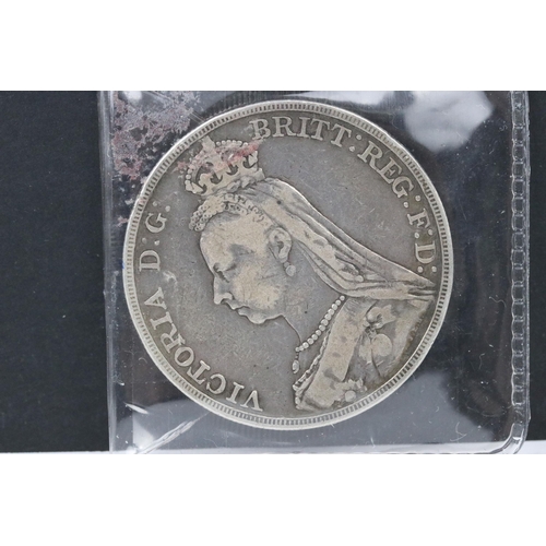 202 - Two United Kingdom Queen Victoria pre decimal silver full crown coins to include 1890 and 1889 examp... 