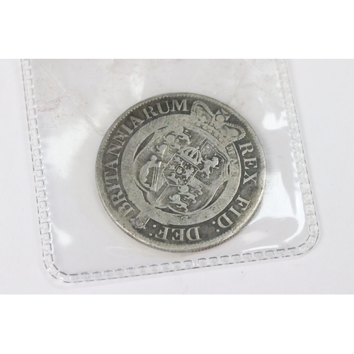 203 - A group of three British pre decimal silver King George III and King George IIII examples to include... 