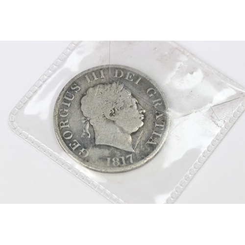 203 - A group of three British pre decimal silver King George III and King George IIII examples to include... 