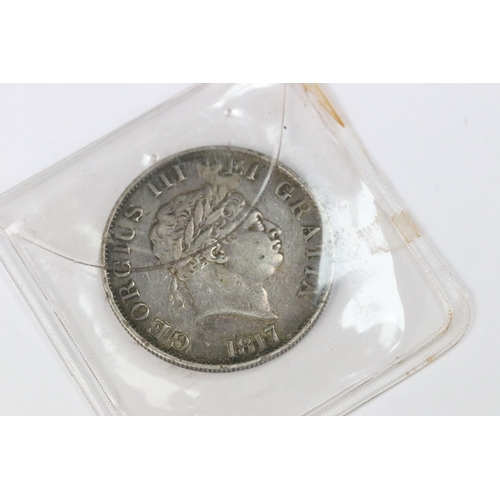 203 - A group of three British pre decimal silver King George III and King George IIII examples to include... 