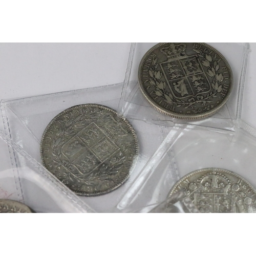 204 - A collection of six British Queen Victoria pre decimal silver half crown coins to include 1879, 1890... 