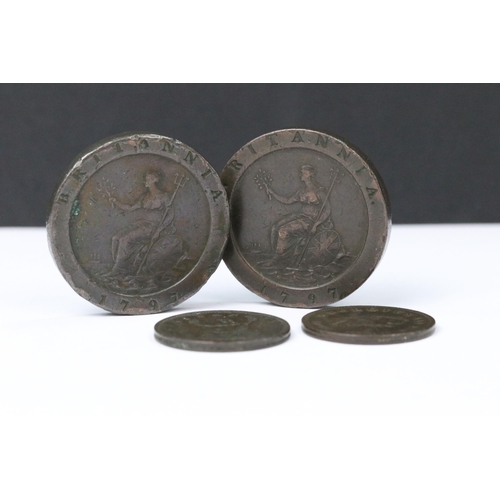 205 - A collection of four British King George III coins to include two 1797 cartwheel two pence coins.