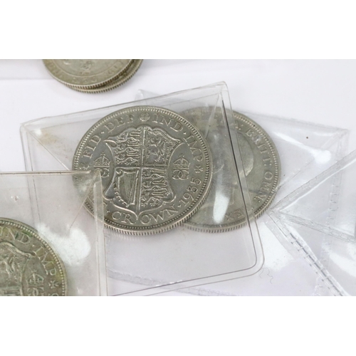 207 - A collection of British pre decimal silver coins to include half crowns, florins, shillings and thre... 