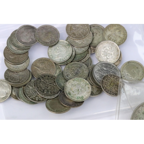 207 - A collection of British pre decimal silver coins to include half crowns, florins, shillings and thre... 