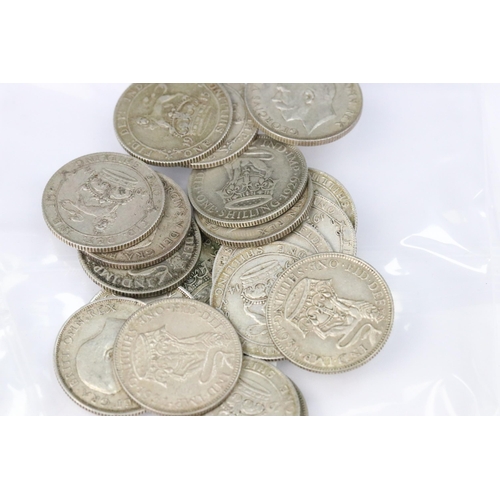 207 - A collection of British pre decimal silver coins to include half crowns, florins, shillings and thre... 