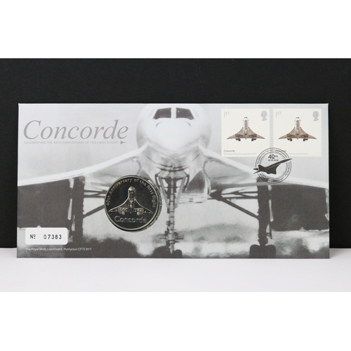 211 - A collection of Royal Mint United Kingdom 50p, £2 and £5 coin covers to include Concorde, D-Day, VE-... 