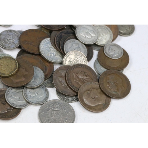 102 - A collection of British pre decimal coins to include a good selection of pre 1947 silver examples to... 