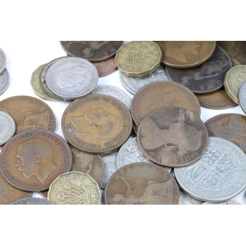 102 - A collection of British pre decimal coins to include a good selection of pre 1947 silver examples to... 