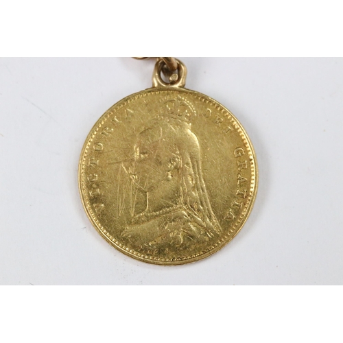 111 - A British Queen Victoria 1887 gold half sovereign coin mounted to small length of 9ct gold chain.