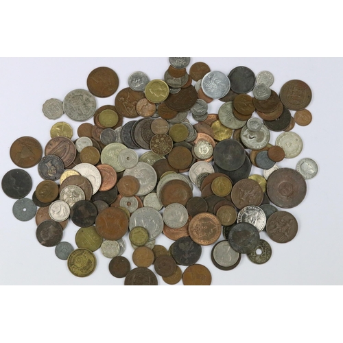 116 - A small collection of British and world coins to include King George III and silver examples.