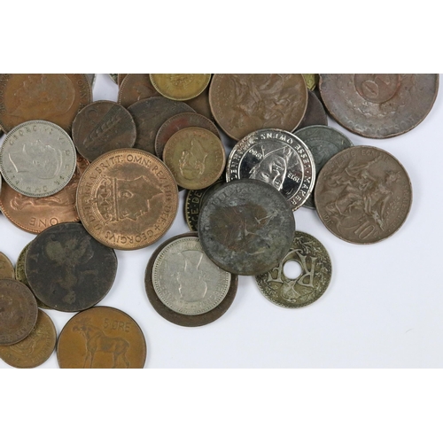 116 - A small collection of British and world coins to include King George III and silver examples.