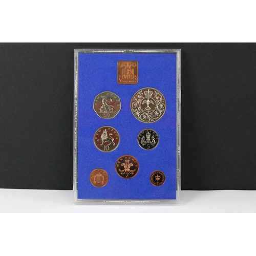 119 - A collection of seven Royal Mint brilliant uncirculated annual coin year sets to include 1978, 1979,... 