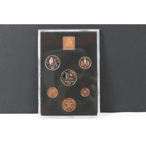 119 - A collection of seven Royal Mint brilliant uncirculated annual coin year sets to include 1978, 1979,... 