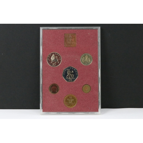 119 - A collection of seven Royal Mint brilliant uncirculated annual coin year sets to include 1978, 1979,... 