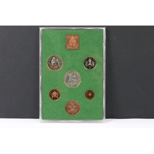 119 - A collection of seven Royal Mint brilliant uncirculated annual coin year sets to include 1978, 1979,... 