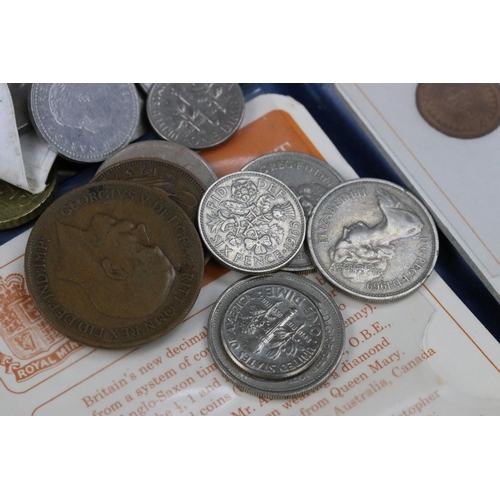 120 - A small collection of mainly British decimal and pre decimal coins to include some silver and commem... 