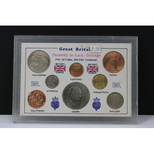 121 - A collection of coin sets to include Queen Elizabeth sixpences, Queen Elizabeth crowns, Queen Elizab... 