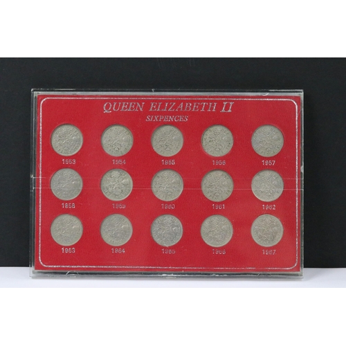 121 - A collection of coin sets to include Queen Elizabeth sixpences, Queen Elizabeth crowns, Queen Elizab... 