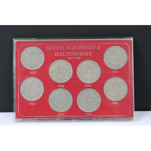 121 - A collection of coin sets to include Queen Elizabeth sixpences, Queen Elizabeth crowns, Queen Elizab... 