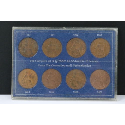 121 - A collection of coin sets to include Queen Elizabeth sixpences, Queen Elizabeth crowns, Queen Elizab... 